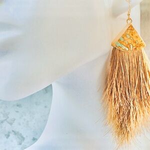 Asymmetrical tassel earrings